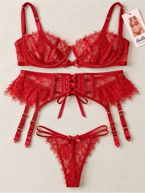 Hustler Hollywood 3-piece lace lingerie set. Red bra, panties and a garter belt.